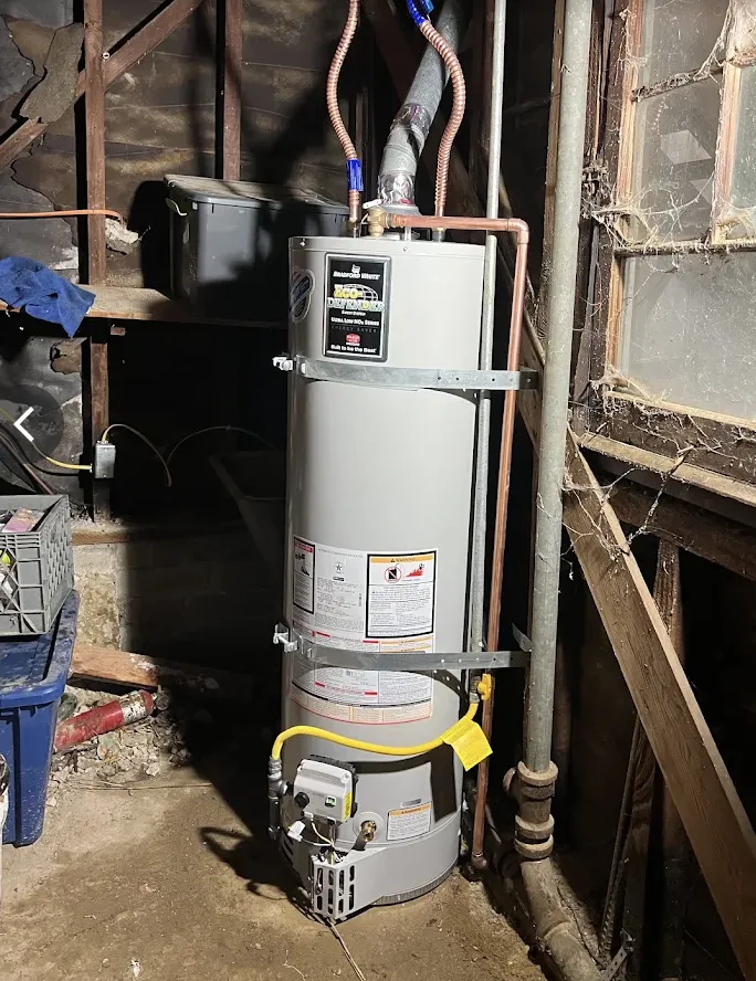 Water heater replacement: new gas tank hooked to supply, gas, vent, and relief lines